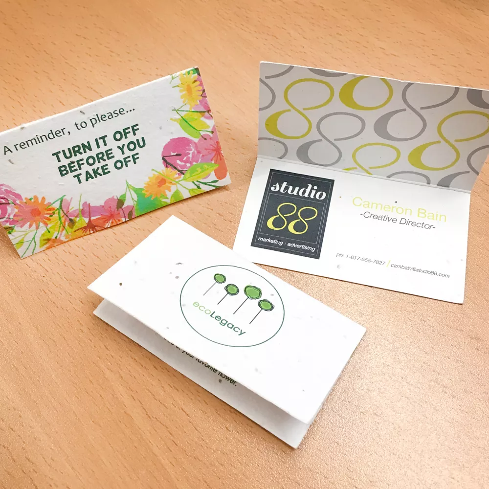 Carte de visite pliée en papier ensemencé, recto-verso