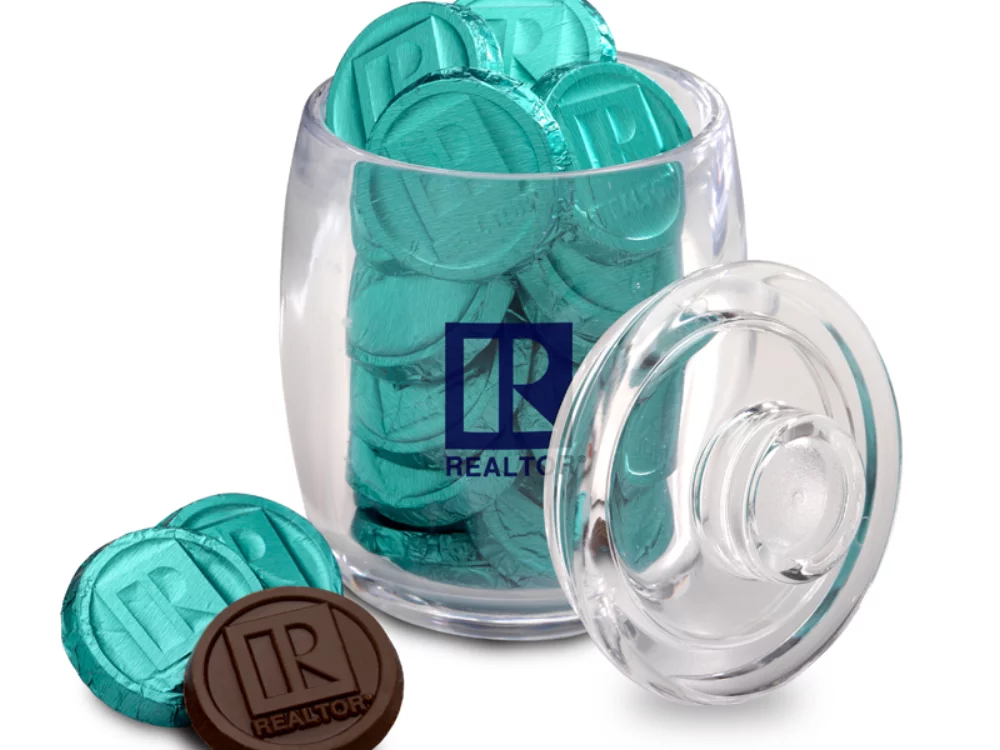 Petit pot en acrylique avec des pièces de chocolat