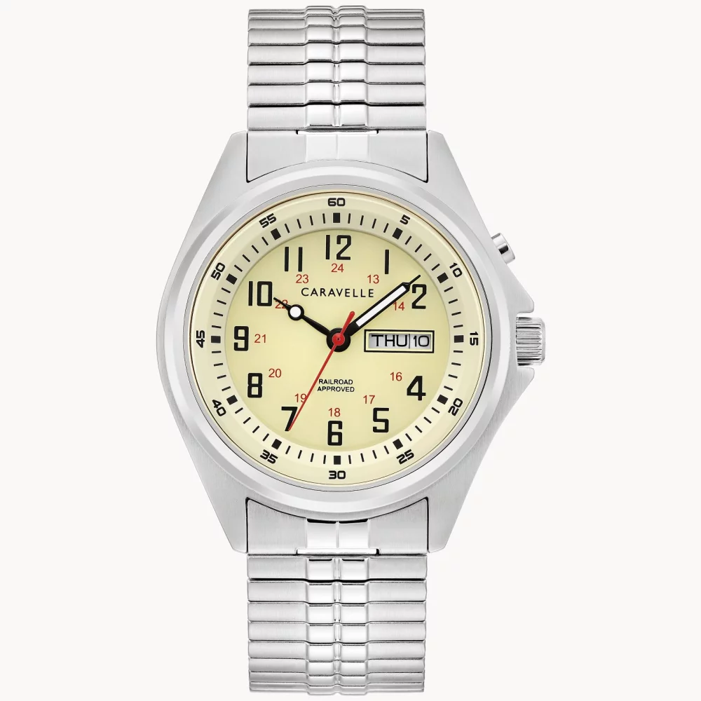 Montre traditionnelle pour homme de la collection Caravelle® en argent avec éclairage.
