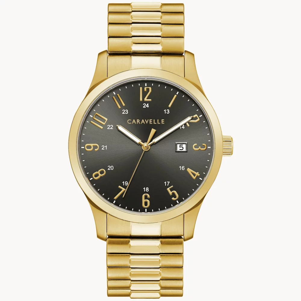 Montre traditionnelle pour homme de la collection Caravelle® en or avec cadran rond gris.