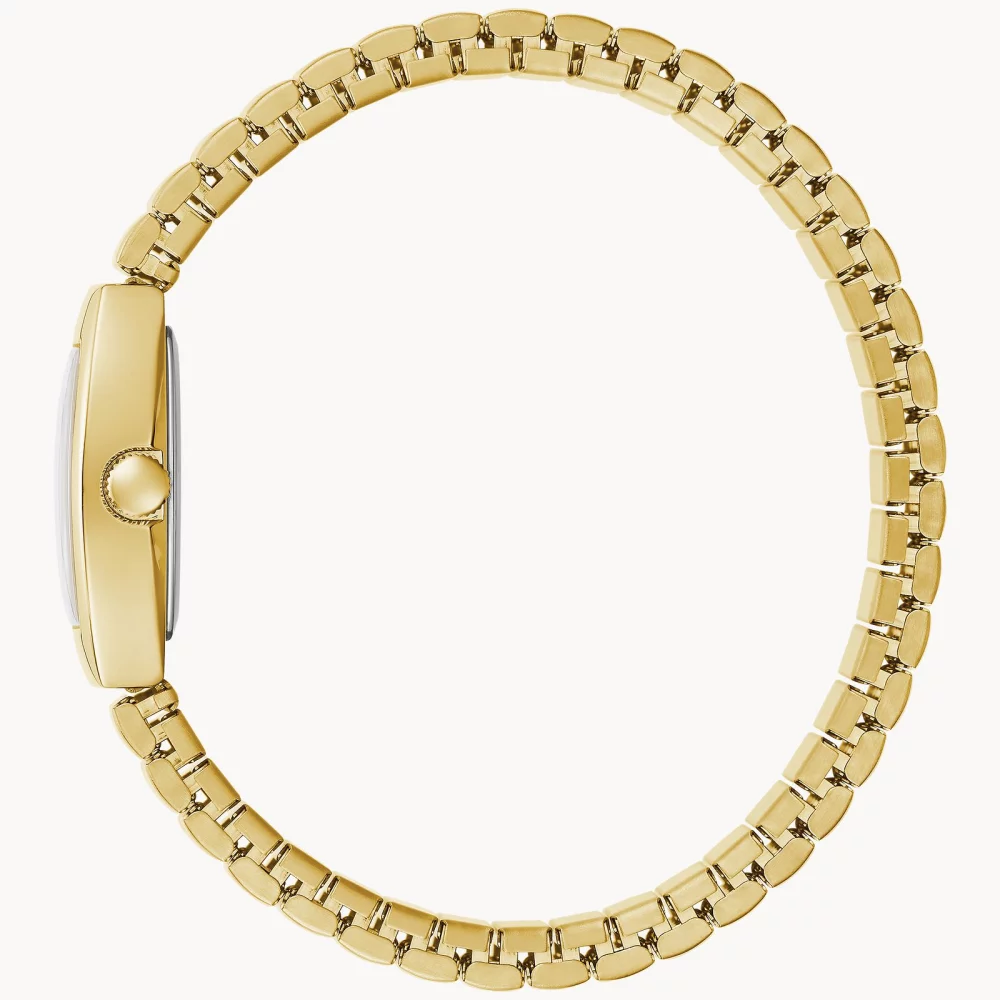 Montre traditionnelle pour femmes de la collection Caravelle® en or avec cadran tonneau champagne en or.