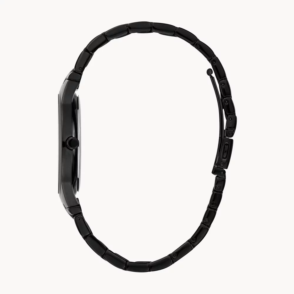 Montre moderne pour homme de la collection Caravelle® avec cadran rond noir mat.