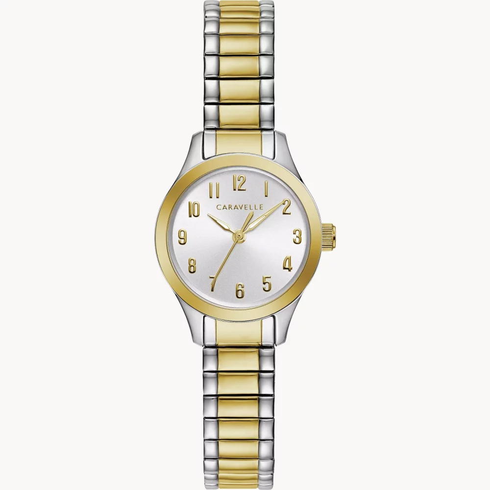 Montre traditionnelle pour femme de la collection Caravelle® avec bracelet bicolore et cadran rond argenté blanc.