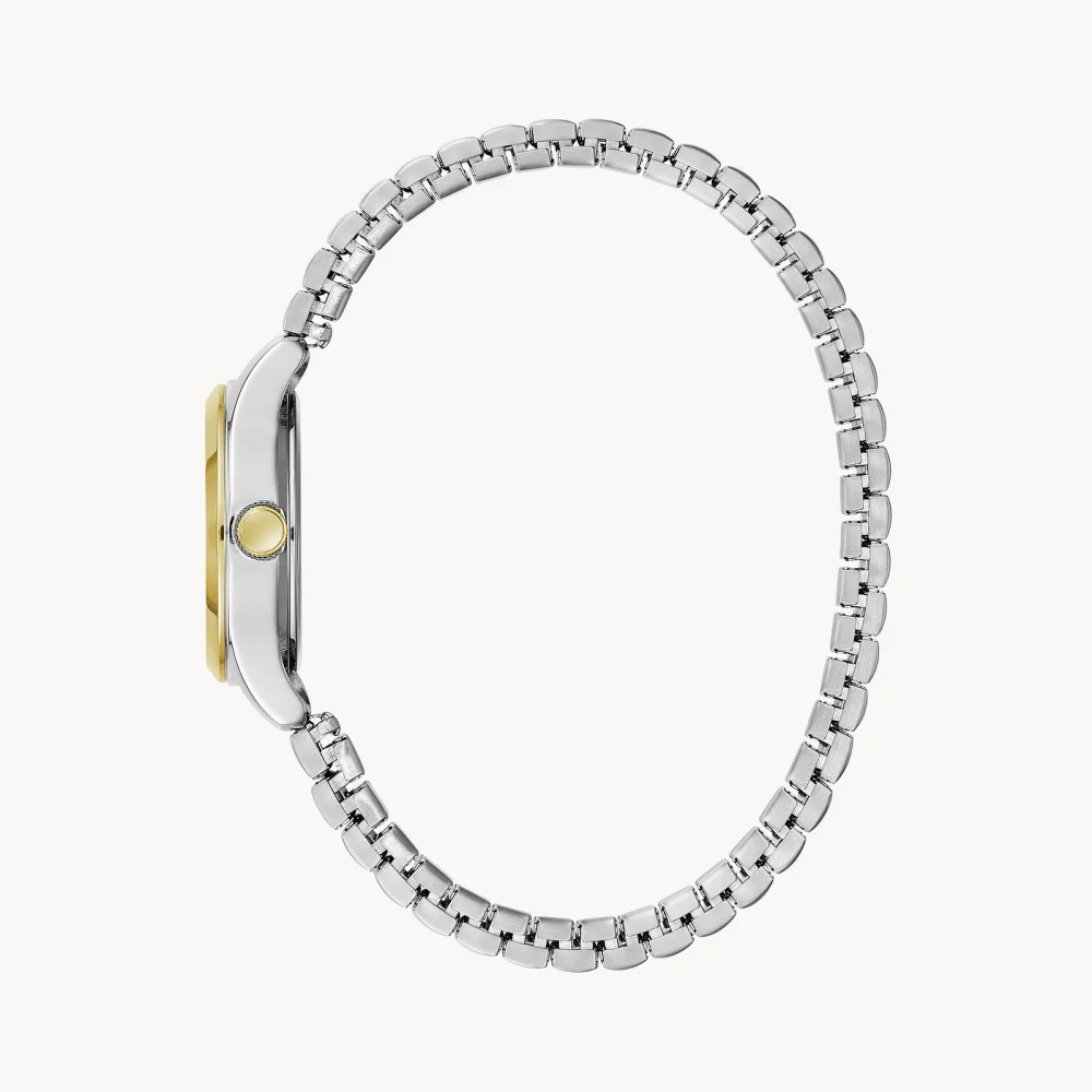 Montre traditionnelle pour femme de la collection Caravelle® avec bracelet bicolore et cadran rond argenté blanc.