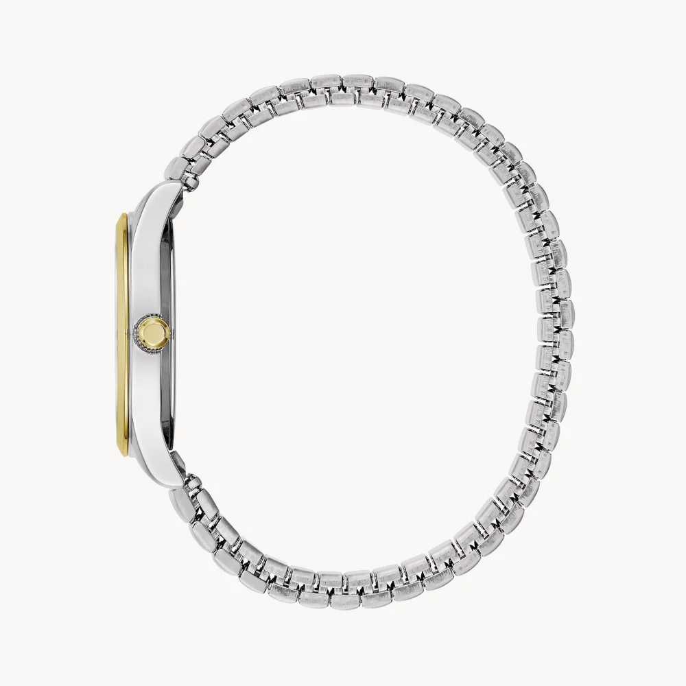 Montre traditionnelle pour femmes de la collection Caravelle® en deux tons avec cadran blanc rond.