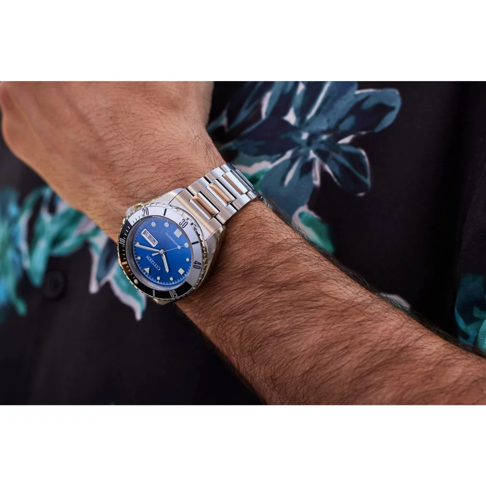 Citizen® Men's Silver Sport Automatic Watch w/Round Blue Dial