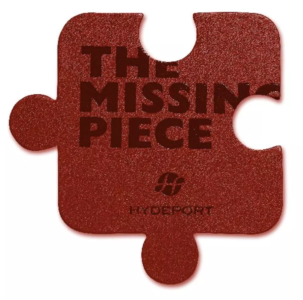 Le sous-verre individuel The Missing Piece marron, en cuir synthétique - dos en feutre