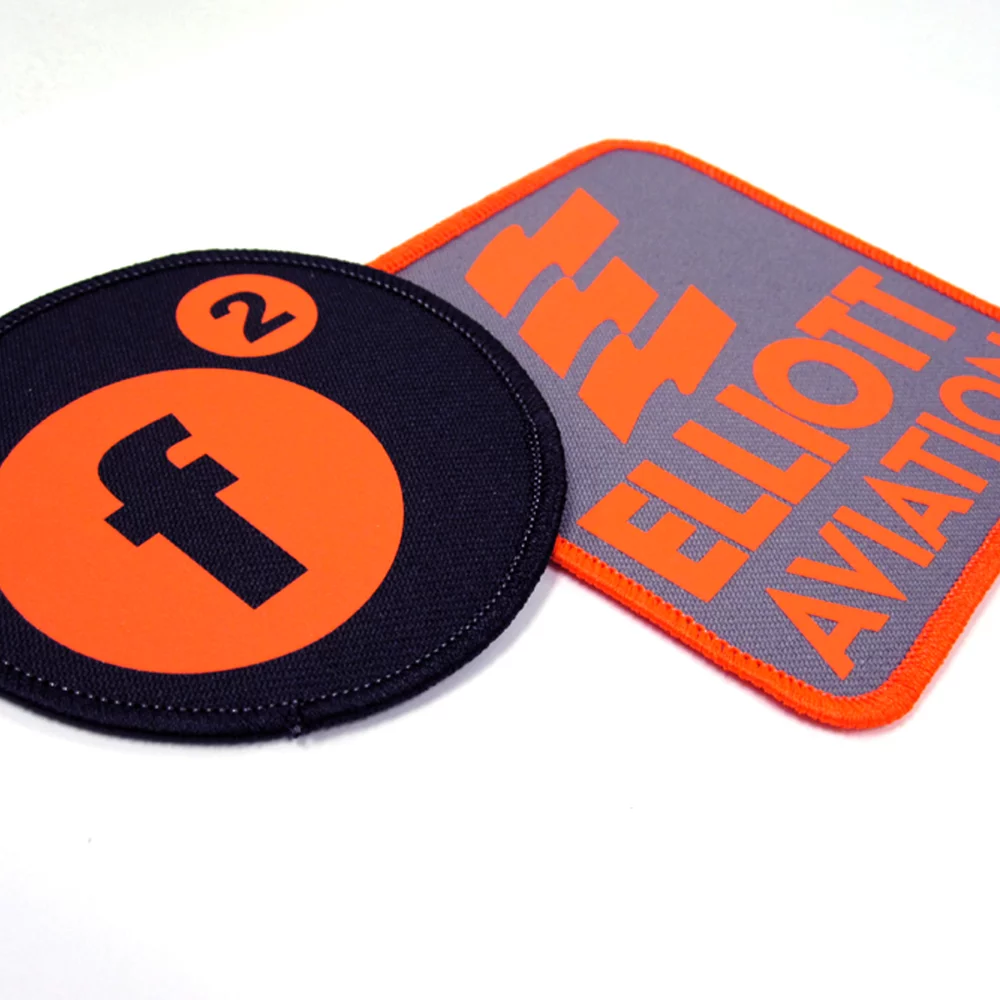 Emblèmes de transfert réfléchissants