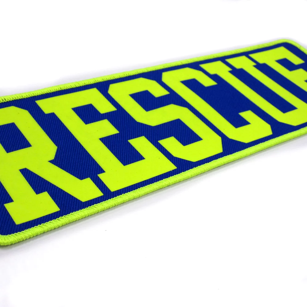 Emblèmes de transfert réfléchissants