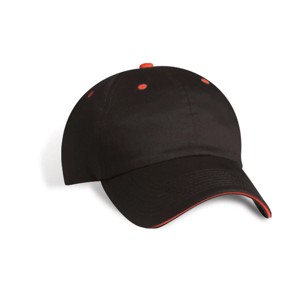 Casquette en sergé de coton non structuré avec œillets contrastants. Bouton et visière sandwich.