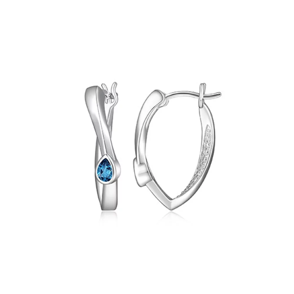 BOUCLES D'OREILLES "Swing" en topaze et zircone cubique pavée, forme de poire torsadée - Argent