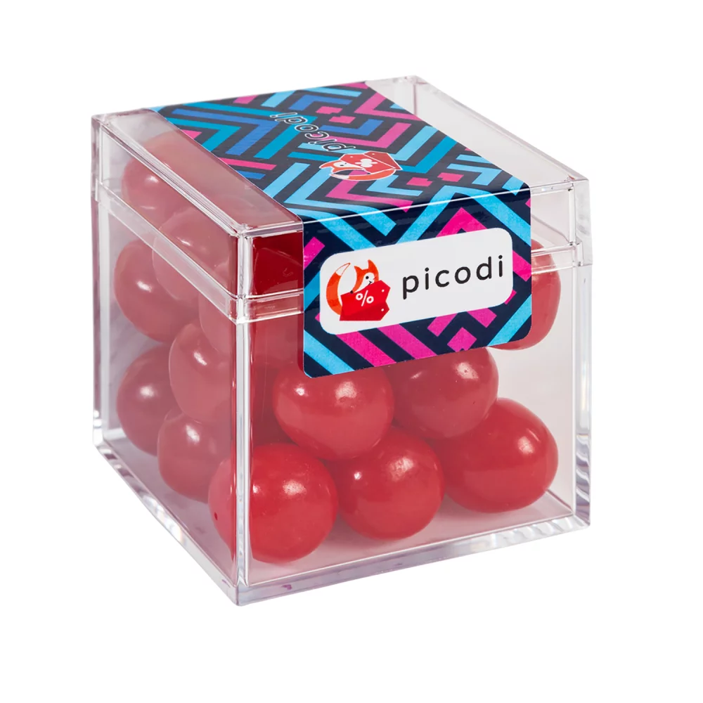 Boîtes sucrées avec des bonbons acidulés aux fruits