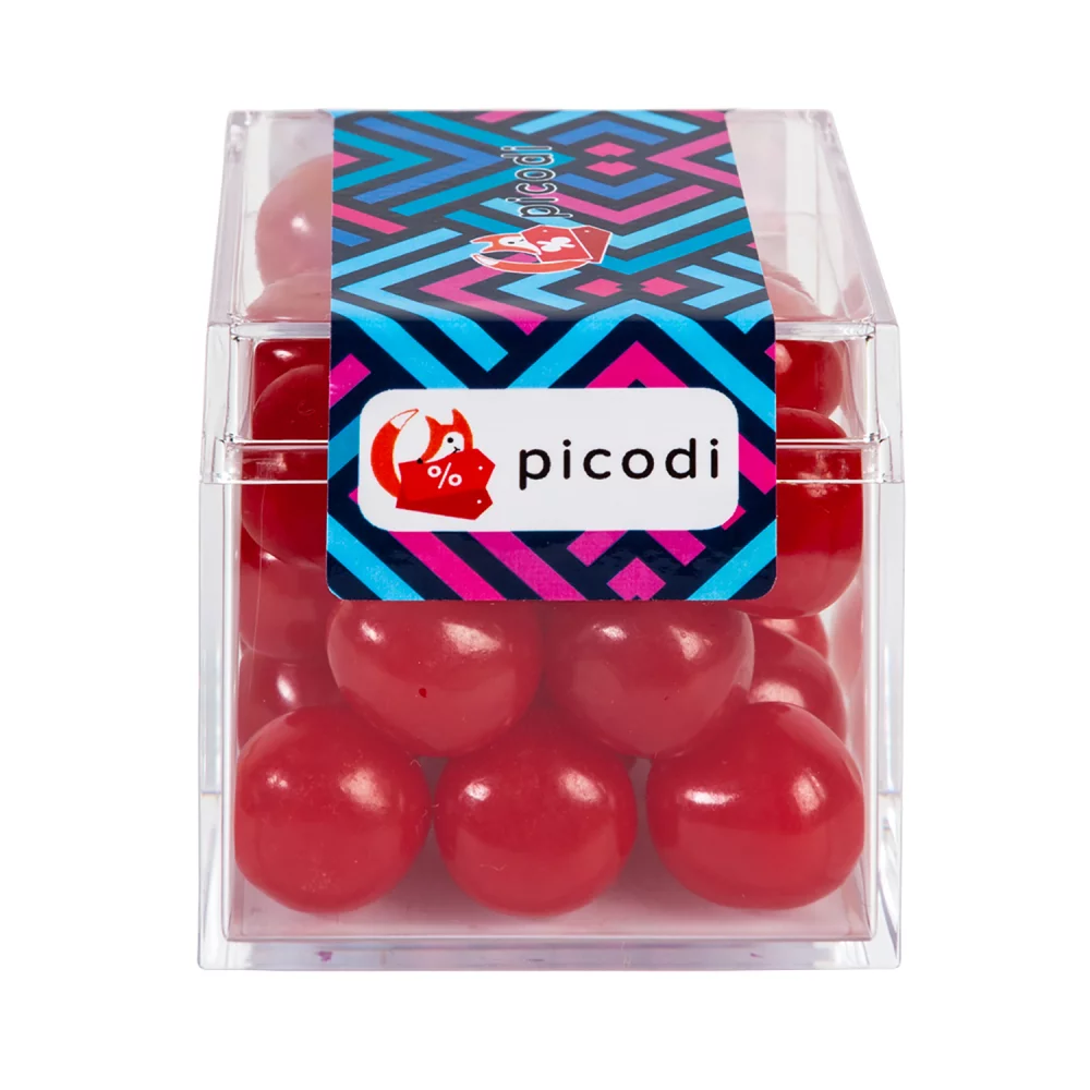 Boîtes sucrées avec des bonbons acidulés aux fruits