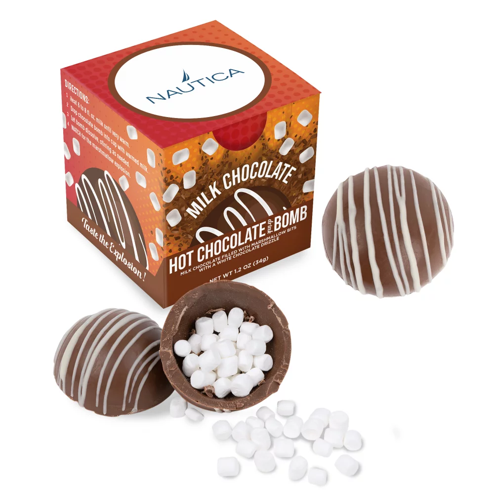 Boule de chocolat chaud dans une boîte cadeau en couleur.