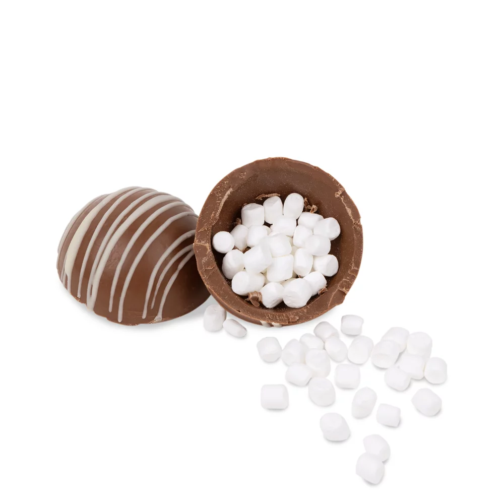 Lot de 4 bombes de chocolat chaud dans une boîte cadeau en couleur.