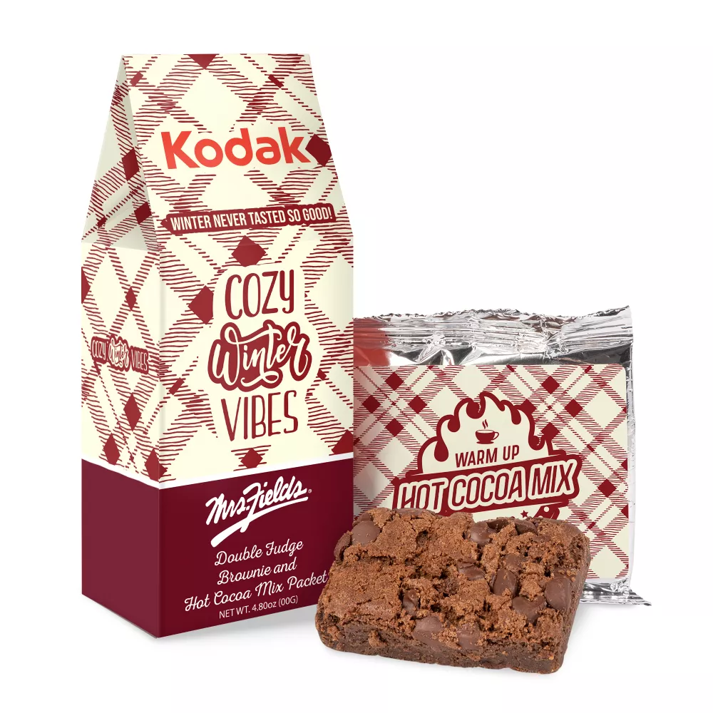 Brownie de Mme Fields et chocolat chaud dans une boîte en forme de pignon