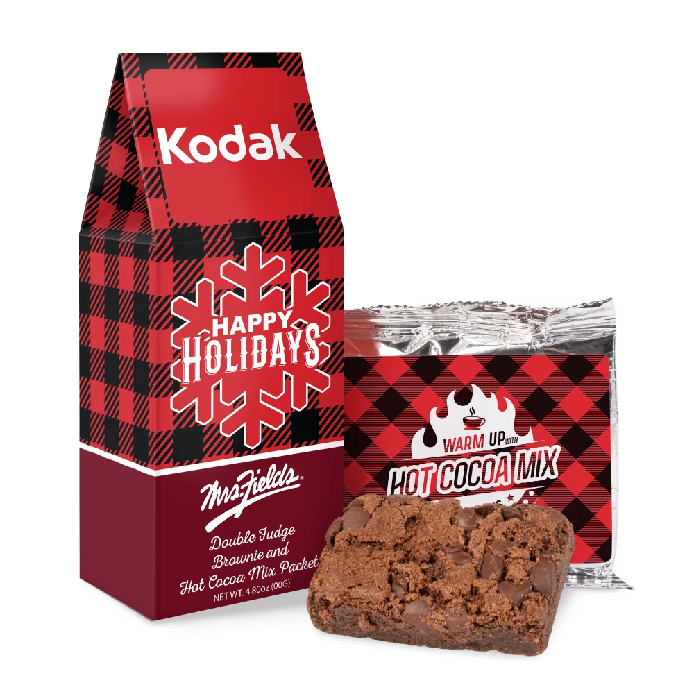 Brownie de Mme Fields et chocolat chaud dans une boîte en forme de pignon