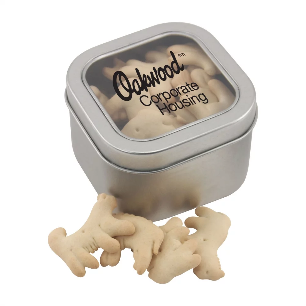 Boîte en fer blanc avec des biscuits en forme d'animaux
