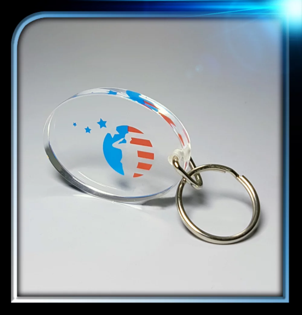 Porte-clés ovale en lucite (2"x1 1/2"x1/4")