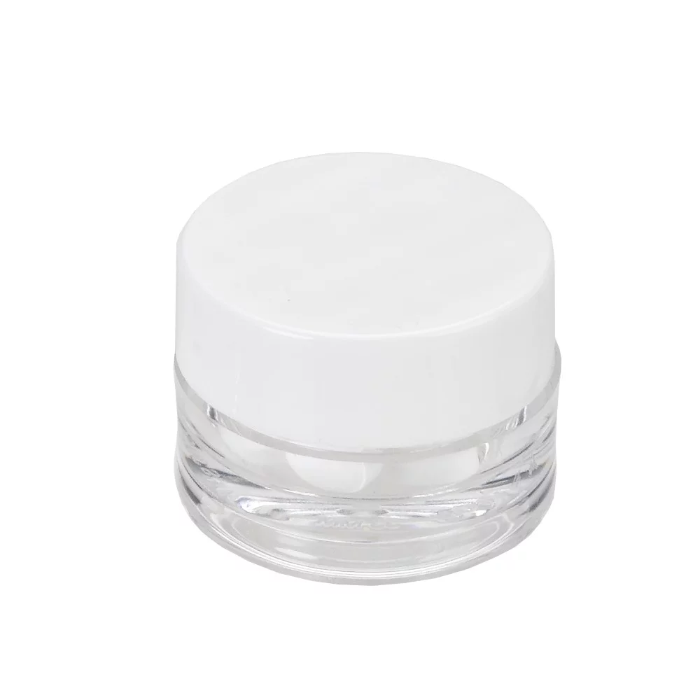 Pot rond avec des bonbons à la menthe