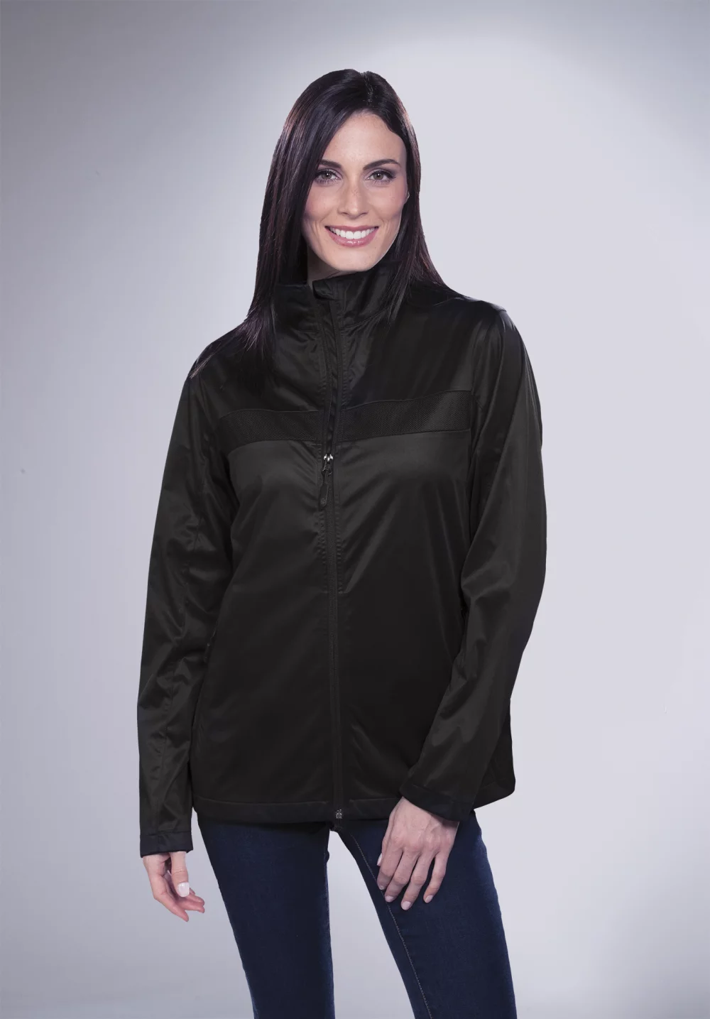 Veste légère de performance pour femmes avec superposition en mesh technique.