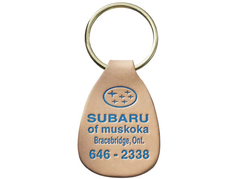 Petite étiquette de clé en cuir naturel avec une petite larme collée des deux côtés (1 3/8" x 2")