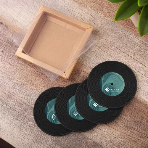 Ensemble de 4 dessous de verre en forme de disque dans une boîte