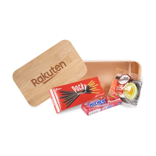 Ensemble cadeau de bonbons et de collations dans une boîte à bento avec couvercle en bambou