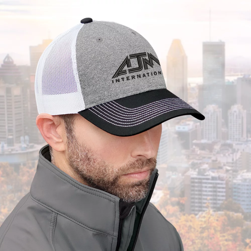 Casquette en toile de coton / polyester chiné / maille en nylon