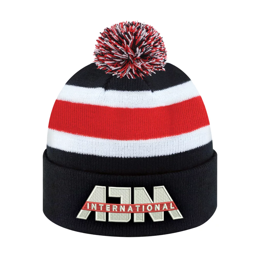 Tuque junior avec revers en pompon et tricot côtelé à rayures.