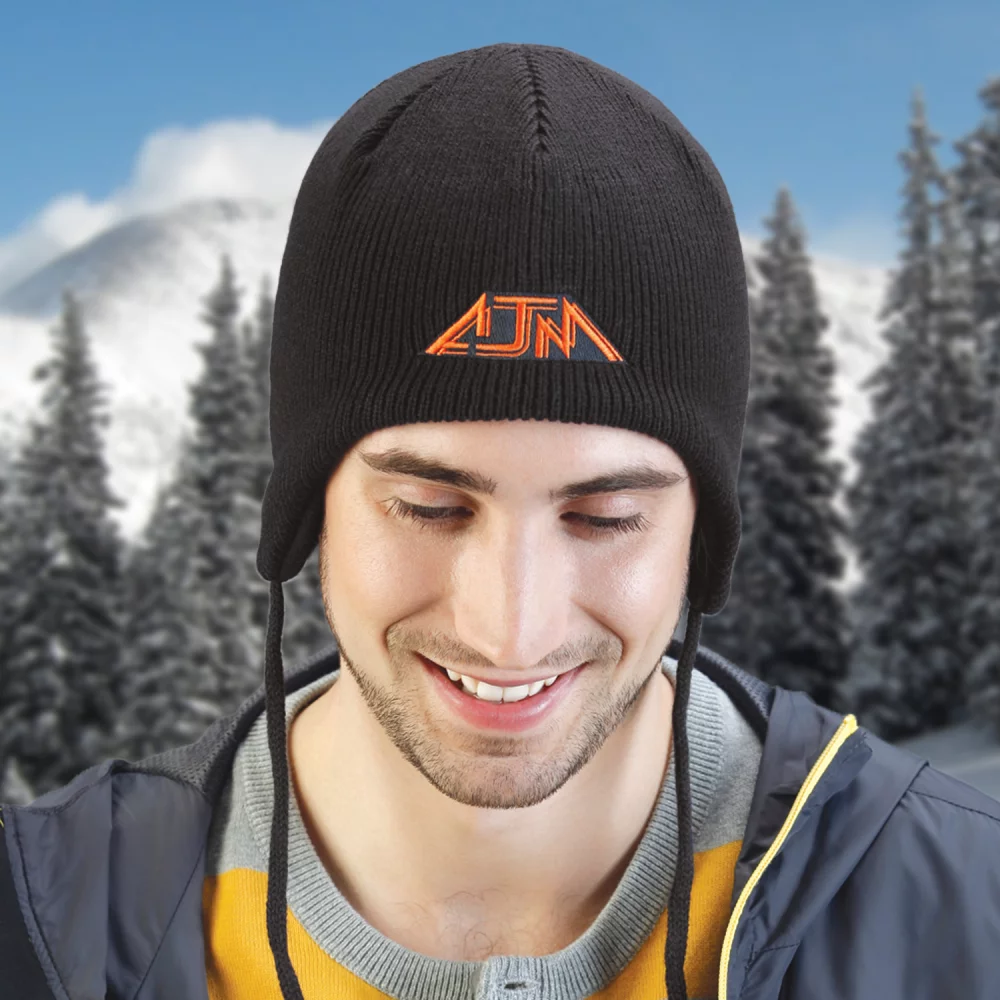 Bonnet en tricot côtelé en acrylique/polyester avec doublure en polaire.