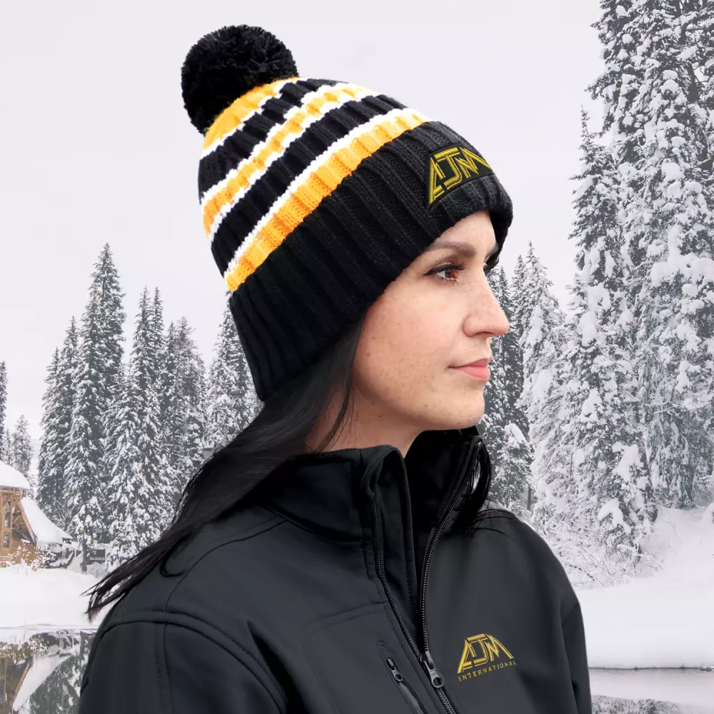 Bonnet en tricot épais à revers avec pompon