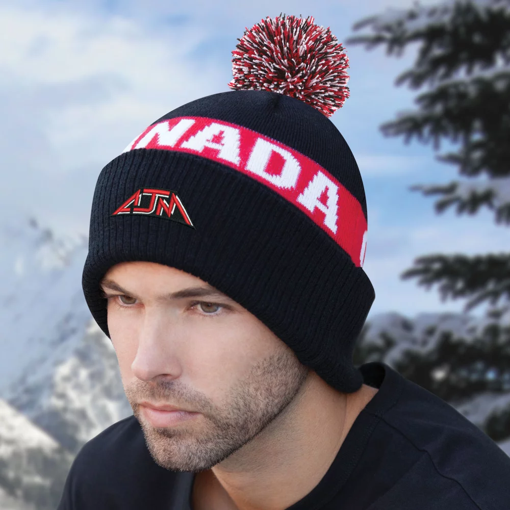 Bonnet en tricot jacquard avec pompon de 8 cm, fabriqué au Canada.