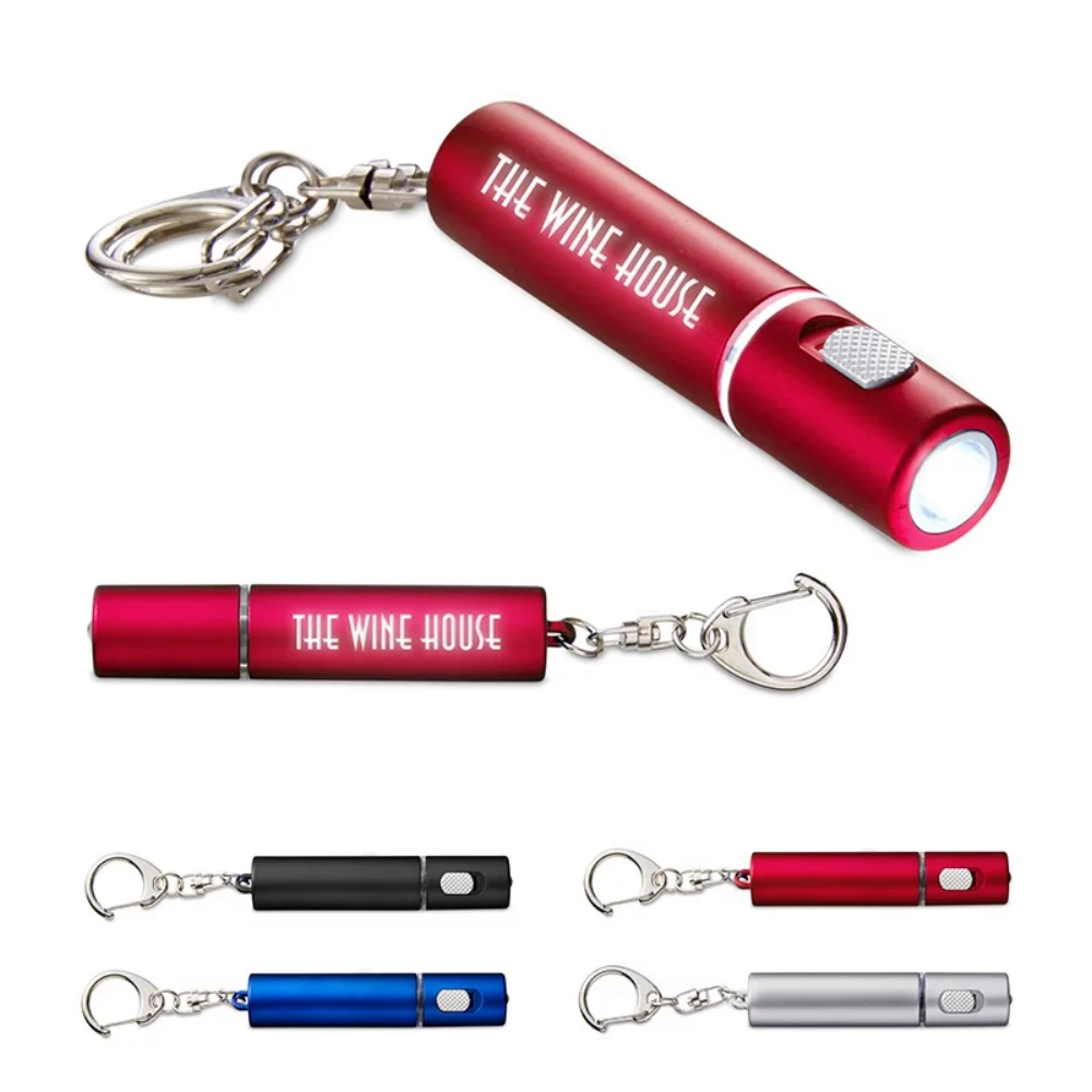 Porte-clés avec lampe de poche illuminant votre logo