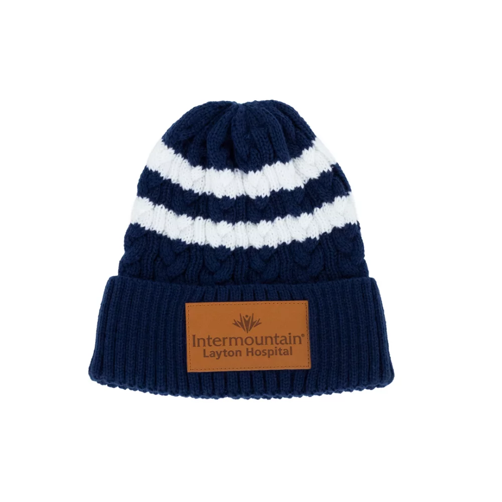 Bonnet en tricot torsadé avec revers/bord retroussé