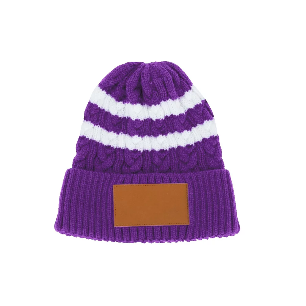 Bonnet en tricot torsadé avec revers/bord retroussé